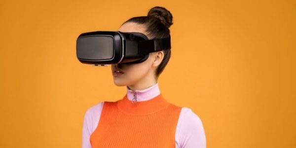 woman-using-virtual-reality-goggles-3761125